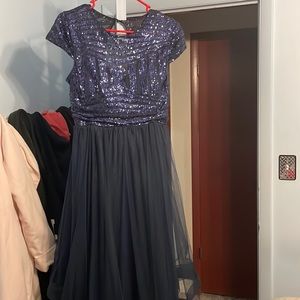 I am selling a prom dress. It’s Blue, size 6 for 300